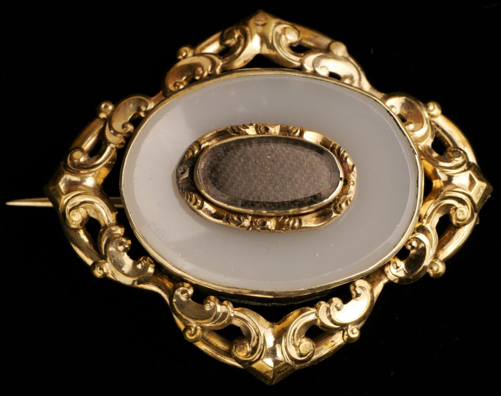 Direct front view of Restored Gold Victorian Hair Pin Mourning Jewelry Piece Display on Black Background