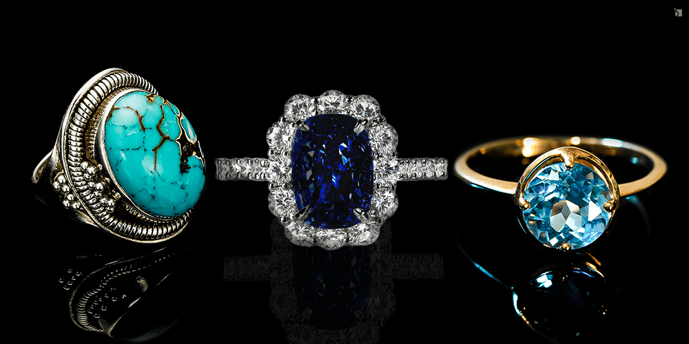 December Birthstone Fine Jewelry Rings Tanzanite Zircon Turquiose Gemstone Reflected on Black Background