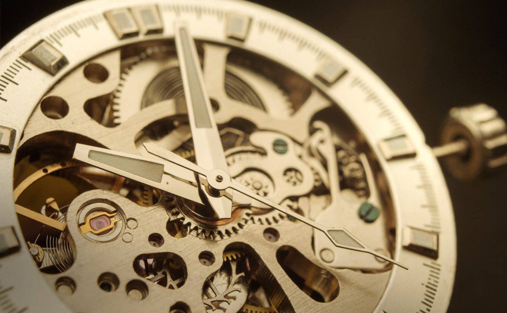 Image showcasing a skeleton style watch which allows the movement to be viewed from the outside