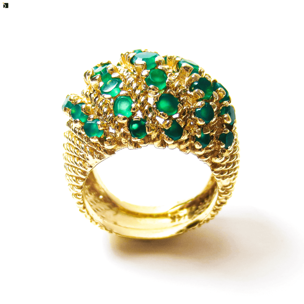 Image Showcasing Restored Gold Ring with Multiple Emerald Gemstones