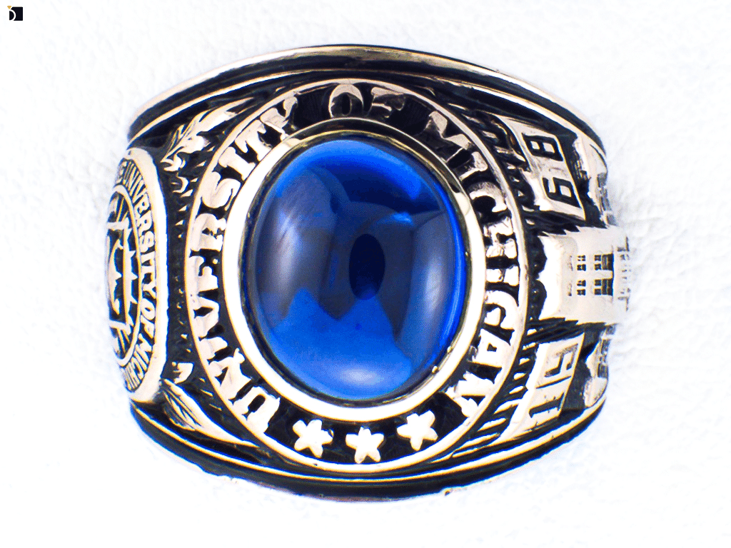 Image Showcasing a Class Ring After It Gets Restored with a Gemstone Replacement