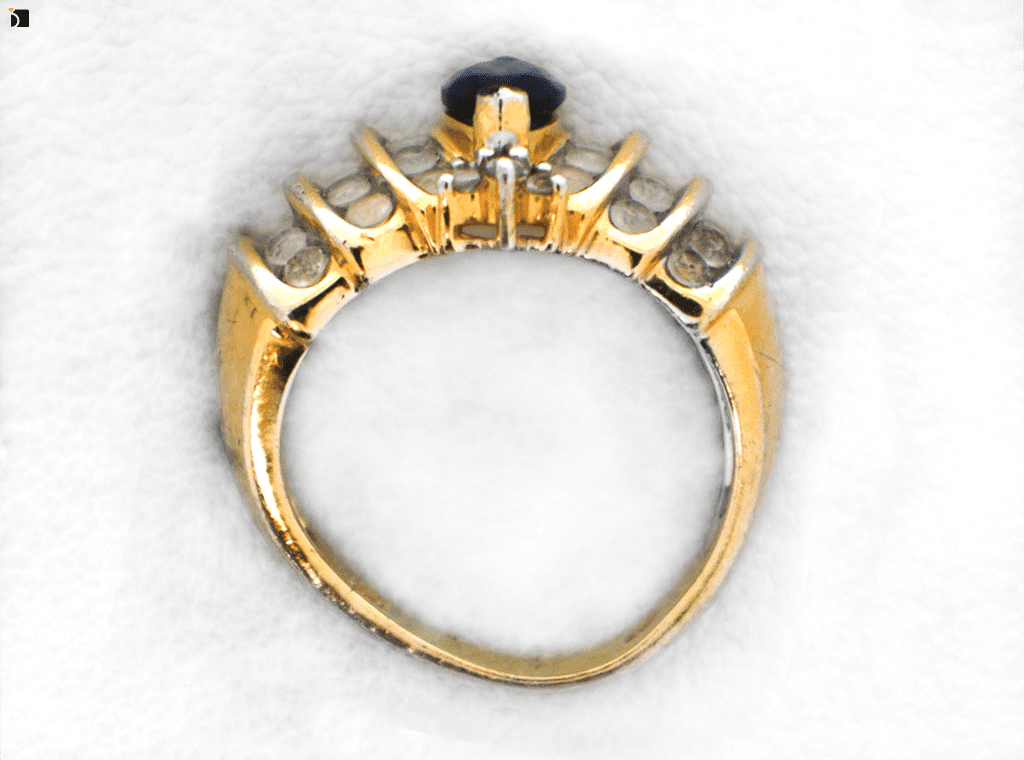 Image Showcasing Flat View of a Gold Ring Before It Gets Refurbished and Reshapen