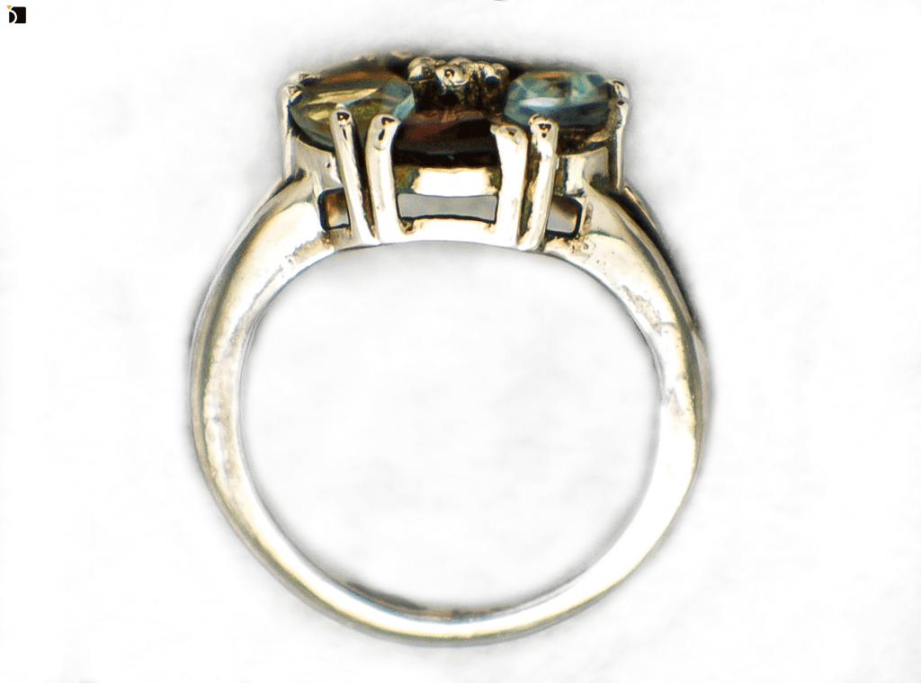 Image Showcasing Flat View of a Multi Gemstone Ring Before It Gets Refurbished and a Citrine Gemstone Replacement