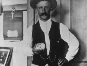 Image Showcasing Frederick Wells Holding Cullinan Diamond Circa 1905