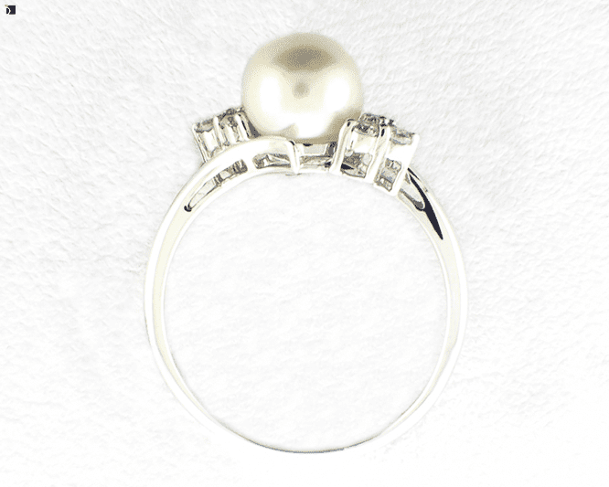 Image Showcasing Flat View After #68 Pearl Ring with Diamonds being Restored with Pearl Replacement and Premier Ring Services