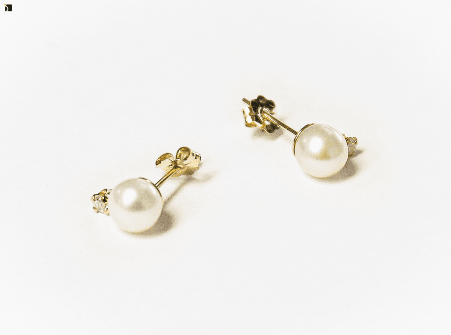 Image showing the After of Before & After #98 of a Pearl Gold Earrings Set Being Restored Through Pearl Gemstone Replacement and Premier Earrings Services
