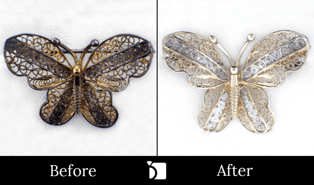 Image Showcasing Before & After #12 of a Tarnished Butterfly Brooch Getting Extreme Restoration Services by Master Jewelers