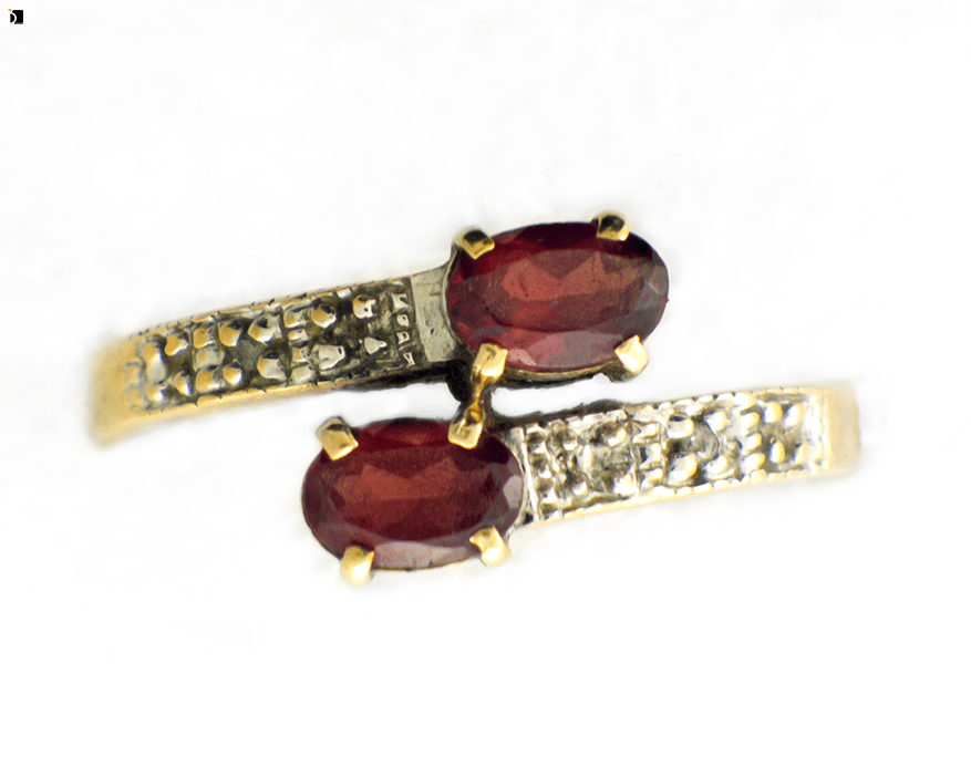 Image showcasing Before #128 Top View of a Ruby and Diamond Ring Being Serviced and Restored by Master Jewelers