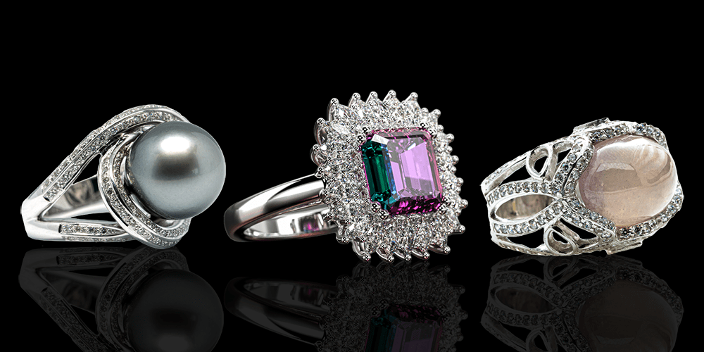 Isolated June Birthstones Pearl Alexandrite Moonstone Gemstone Rings Fine Jewelry Feature Image