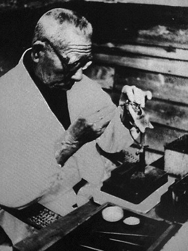 Kokichi Mikimoto Working on Cultured Pearls