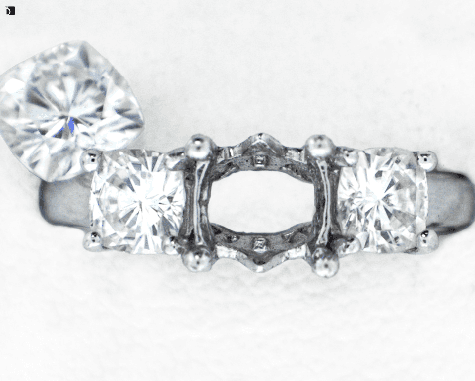 Before #38 of a Ring and a Loose Moissanite Prior to Receiving Premier Gemstone Resetting Services