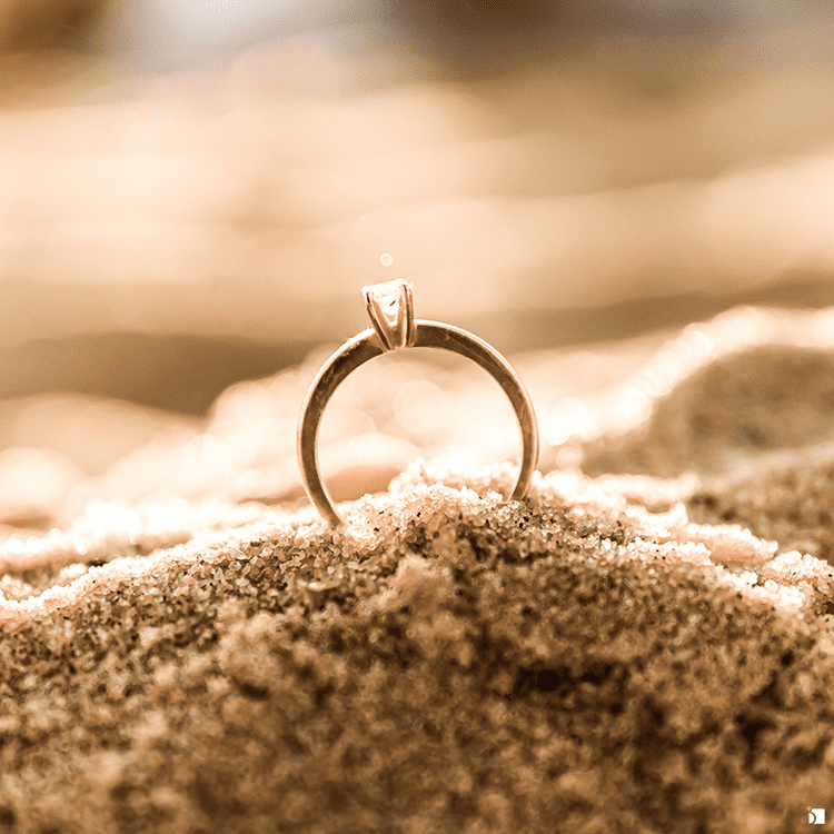 Serviced and Restored Diamond Gemstone Engagement Ring in Beach Sand