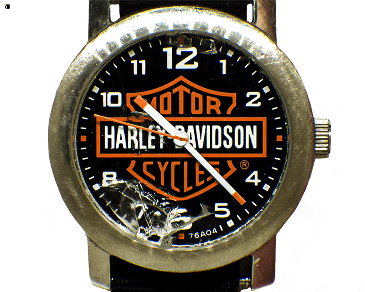 Before #89 Cracked Harley Davidson Timepiece Prior to Premier Watch Repair Restoration Services