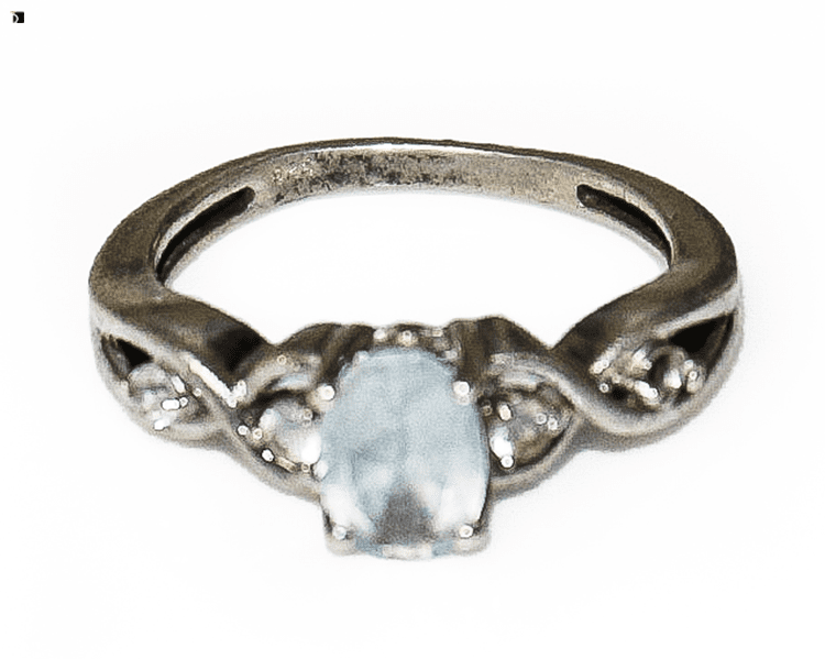 Before #106 Front View of Tarnished Silver Ring with Hazy Aquamarine Center Stone Prior to Premier Ring Repair Services