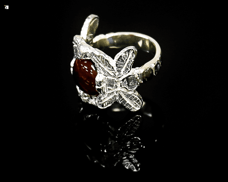 After #110 Side View of Red Gemstone Silver Ring Restored by the work of Master Jewelers