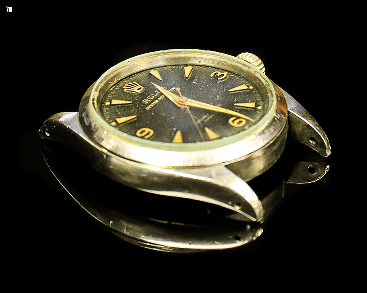 Before #113 Side View of 1950's Rolex Timepiece Prior to Premier Vintage Restoration Services