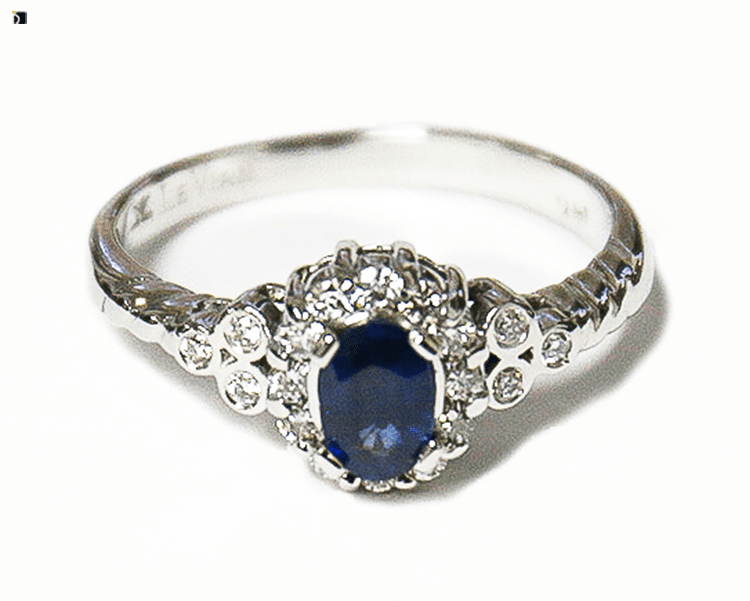 After #99 Front View of 14k White Gold Sapphire Gemstone Ring Restored by Ring Repair Services at Jewelry Facility