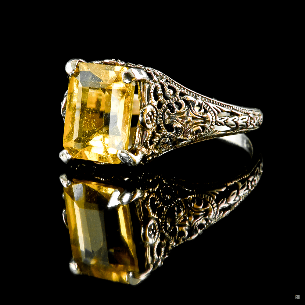 Isolated Restored Fine Jewelry Citrine Gemstone Ring Reflected Against Black Background