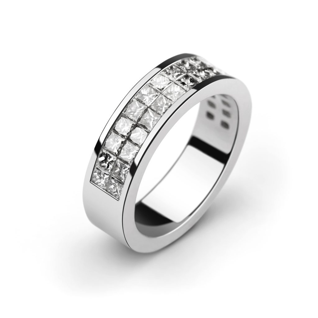 image showing white gold (rhodium) ring with an invisible setting with a white backdrop