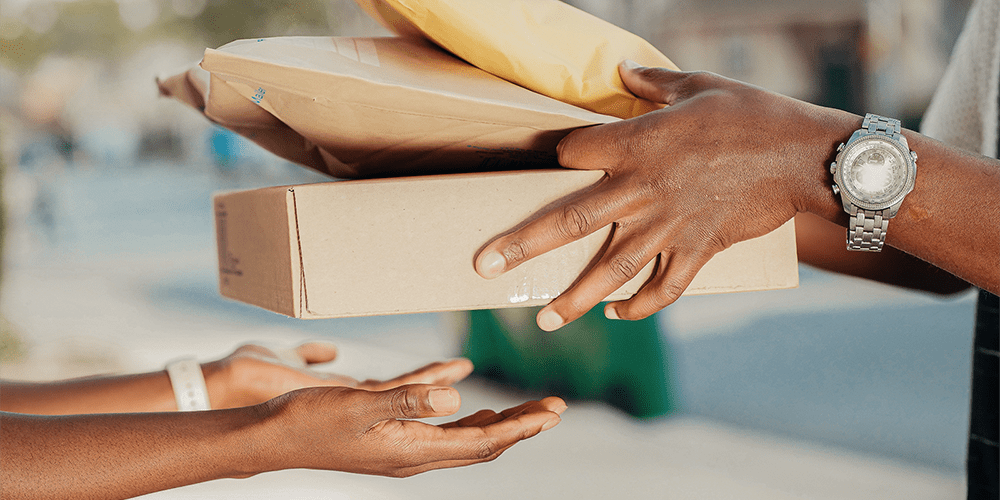 My Jewelry Repair Customer Handing Off Package to Delivery Man Watch Repair by Mail