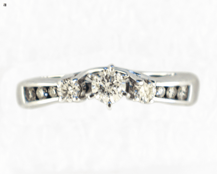 After #143 Top Down Shot of White Gold Symbol of Love Ring Set with Restored Diamond Gemstones