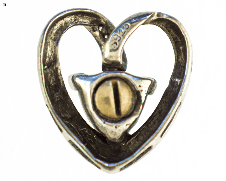Before #145 Back View of Heart-Shaped Necklace Pendant Prior to Premier Necklace Restoration Services