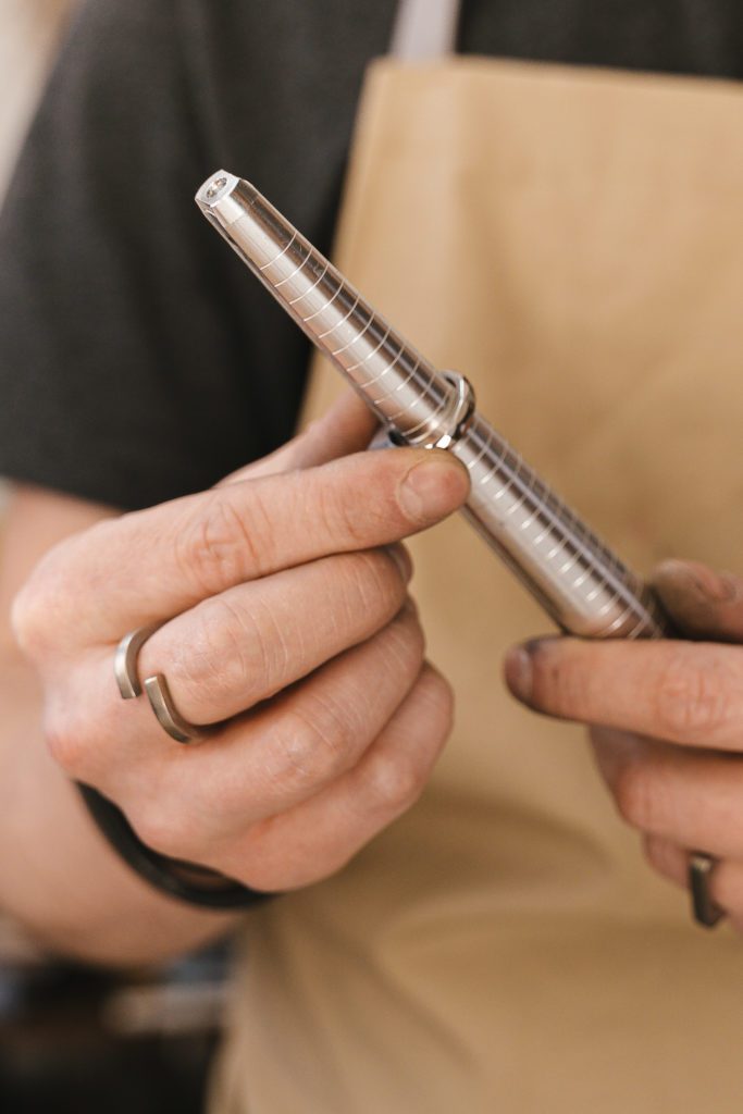 Image of jeweler resizing ring