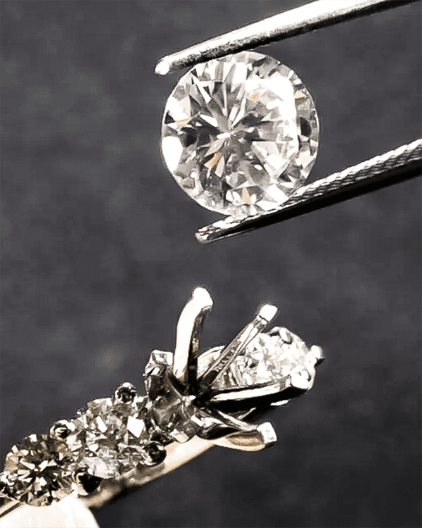 Close Up Master Jeweler Tweezing Tool Replacing Diamond Gemstone Ring Repair Restoration Services