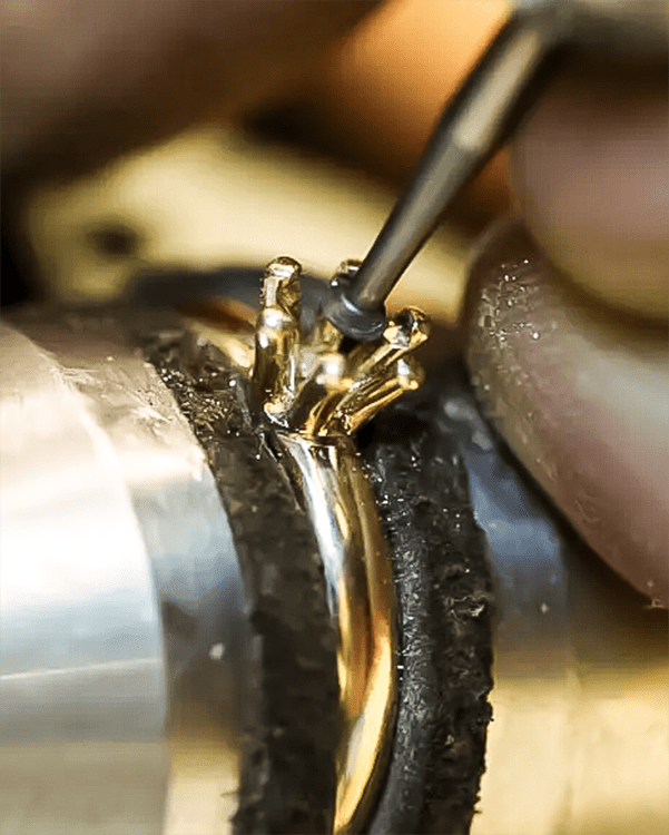 Close Up Master Jeweler Repairing Gemstone Setting Ring Repair Restoration Services