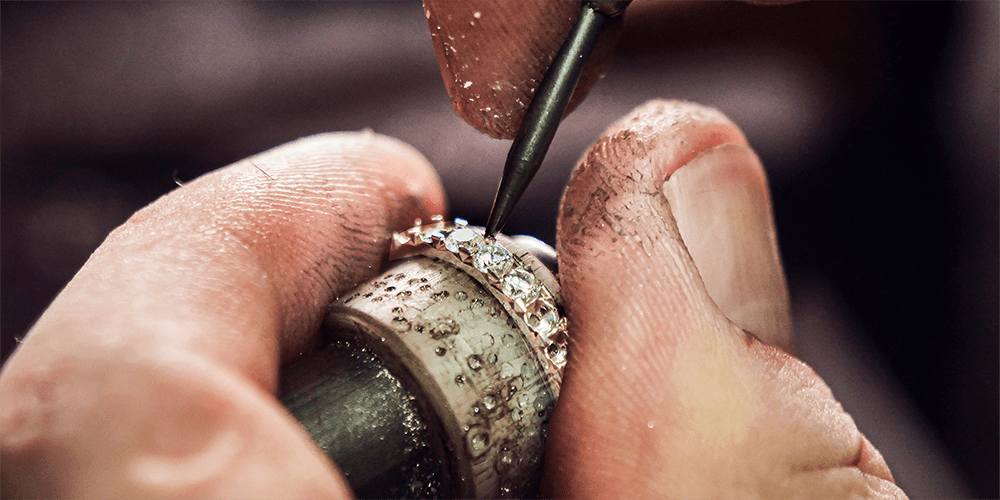 Master Jeweler Working on Fine Jewelry Ring Setting Retipping Prongs