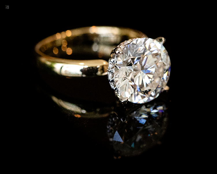 After #162 Angled View of Diamond Engagement Ring with Hidden Halo Restored by Ring Services