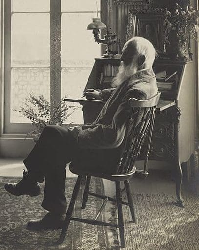 Photo of Charles Lewis Tiffany sitting in his home circa 1902.