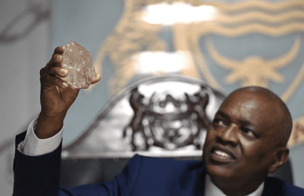 Photo of President Mokgweetsi Masisi of Botswana holding the 2,492-carat diamond via The Washington Post