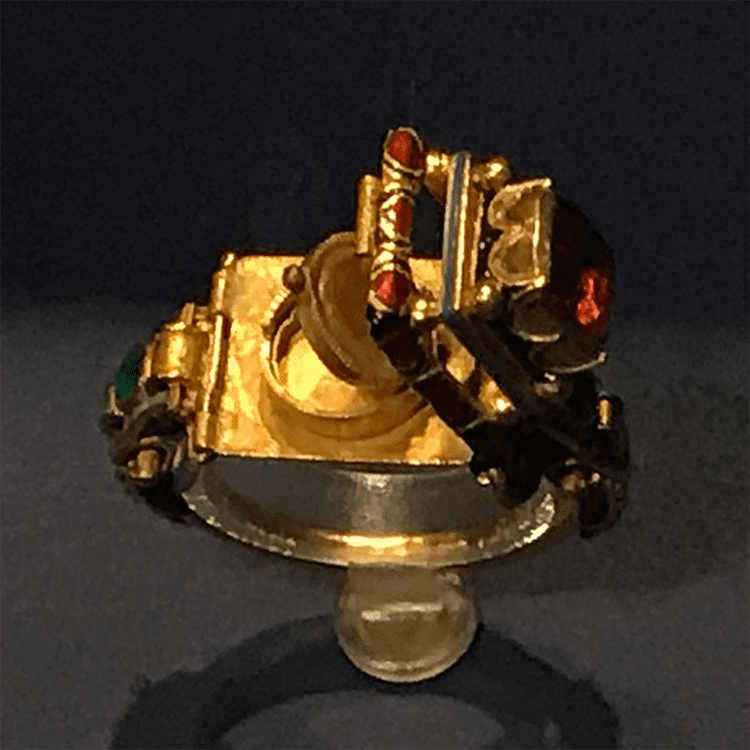 Gold and Red Poison Ring with Latch Opened (via wikipedia)