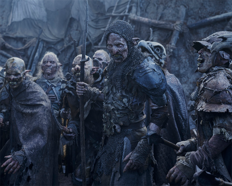 Glûg Surrounded by Orcs and Adar's Children (via Amazon Studios)