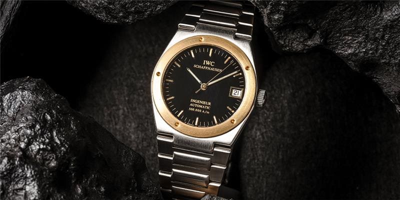 IWC Schaffhausen Gold and Silver Watch Displayed in Black Granite for Authorized Services