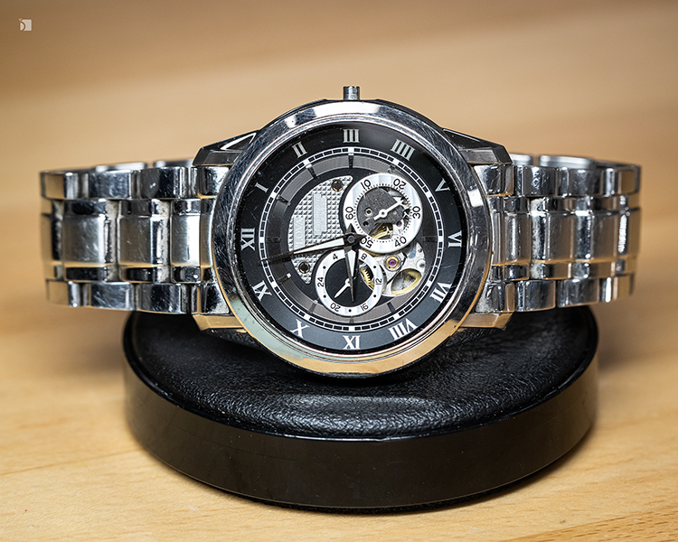 Before #178 Front Facing View of Damaged Bulova Automatic Timepiece Prior to Premier Watch Servicing