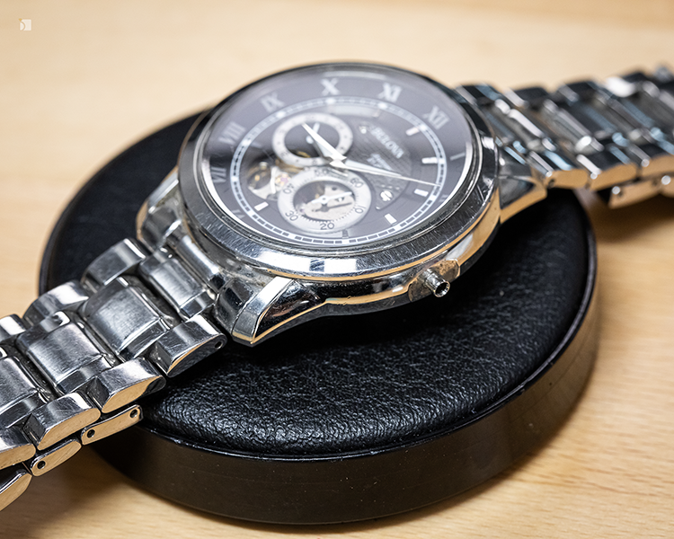 Before #178 Side Display View of Damaged Bulova Automatic Timepiece Prior to Watch Overhaul Services