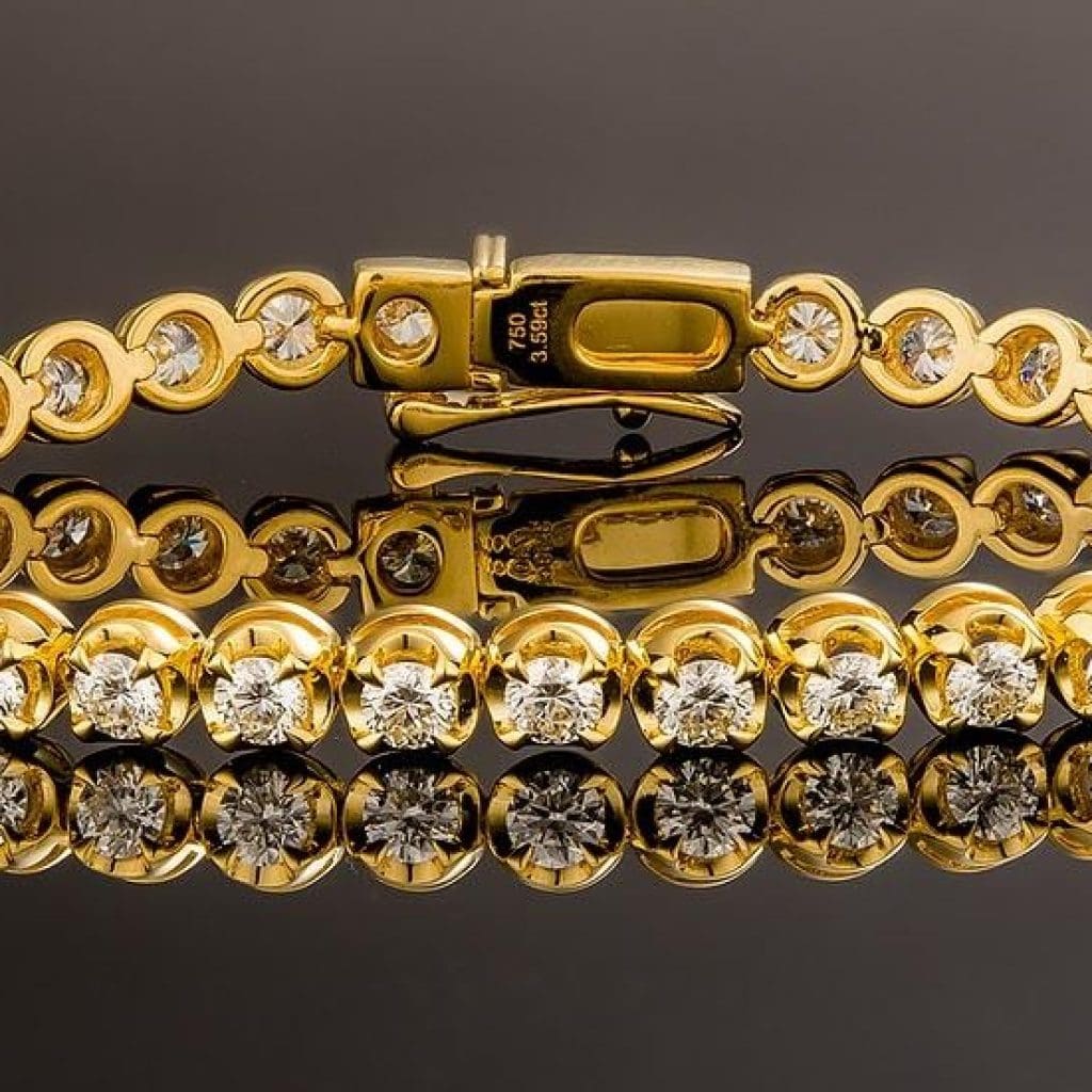 Image showcasing gold diamond tennis bracelet