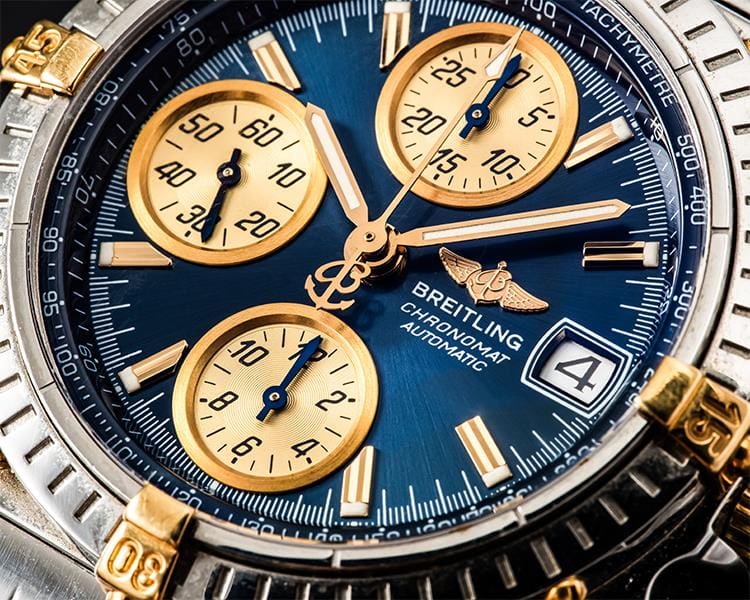 Close Up of Blue Breitling Automatic Chronomat Timepiece