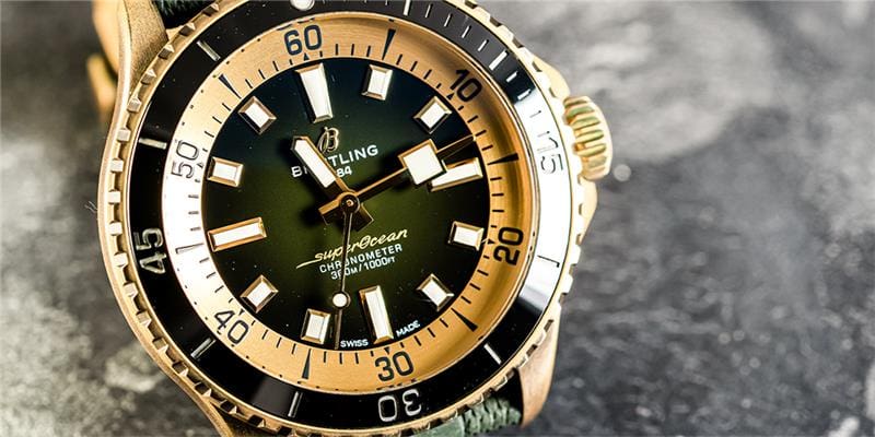 Green Super Ocean Breitling Timepiece on Diplay Professional Authorized Watch Repair