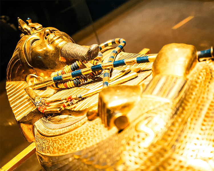 Original gold mask of the pharaoh in museum Display