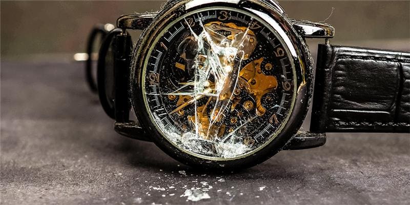 Completely Damaged Timepiece with Shattered Watch Crystal