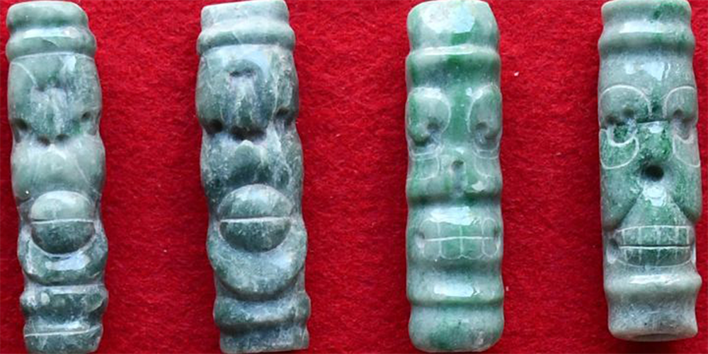 Four Jadeite Tubular Beads Showing Live and Dead Spider Monkeys in Tomb of Caracol's First King