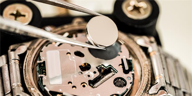 Close Up of Certified Watchmaker Performing Authorized Watch Battery Replacement Services