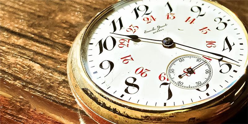 When You should get your dial refinish Close Up of Restored Pocket Watch by My Jewelry Repair Displayed on Leather Bag