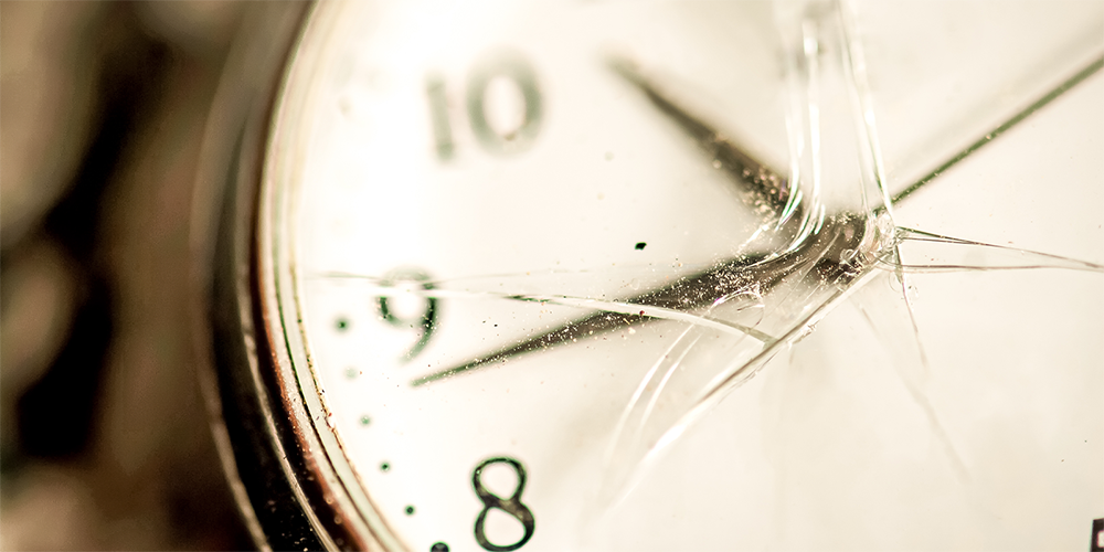 Close Up of Timepiece with Deeply Scratched Watch Crystal