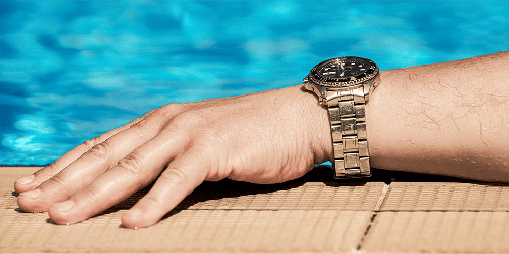 Man Wearing Wristwatch at Pool