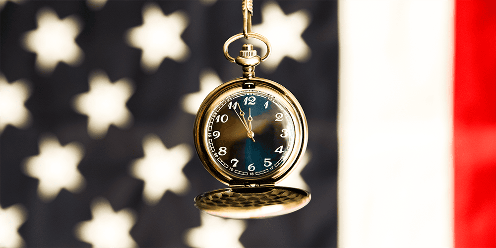 Restored Pocket Watch Timepiece Displayed in Front of USA Flag