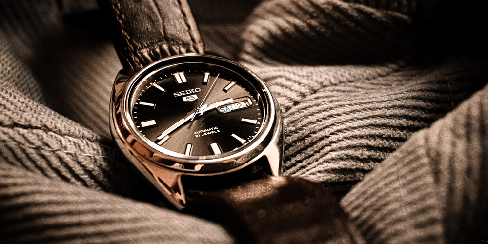 Seiko 5 Automatic 21 Jewelers Watch Timepiece on Display on Grey Cloth